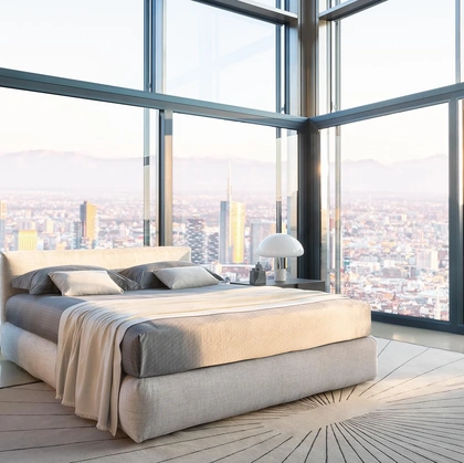 Letto matrimoniale in tessuto imbottito con contenitore Merkurio di Flou