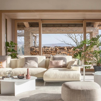 Divano in tessuto con piedini in metallo e penisola Oliver di Flou