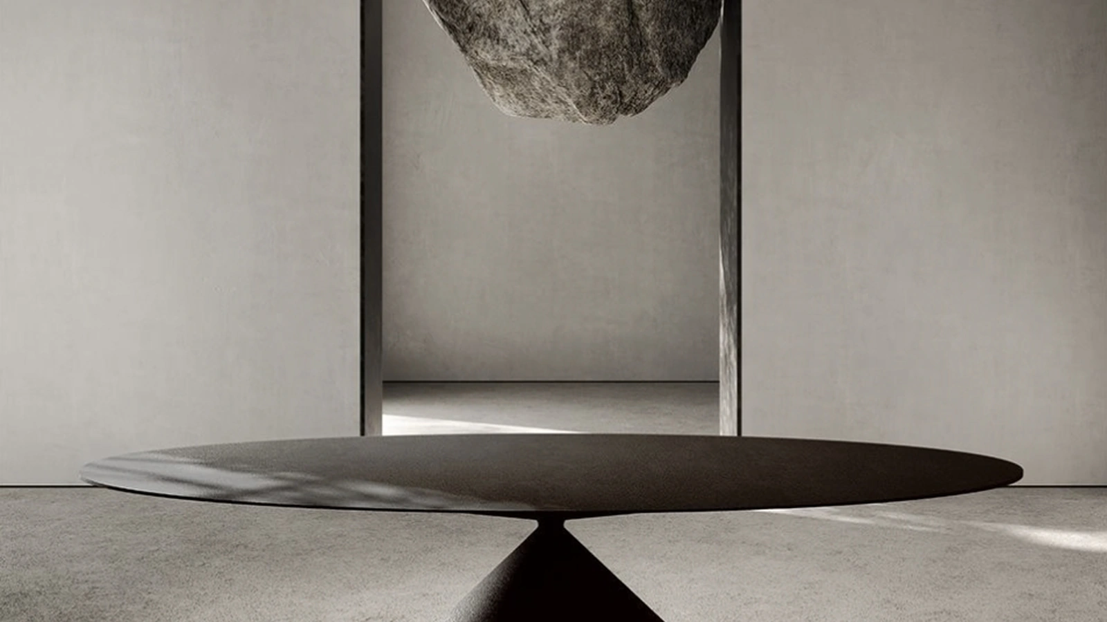 Tavolo Maxy Clay in spatolato materico nero di Desalto