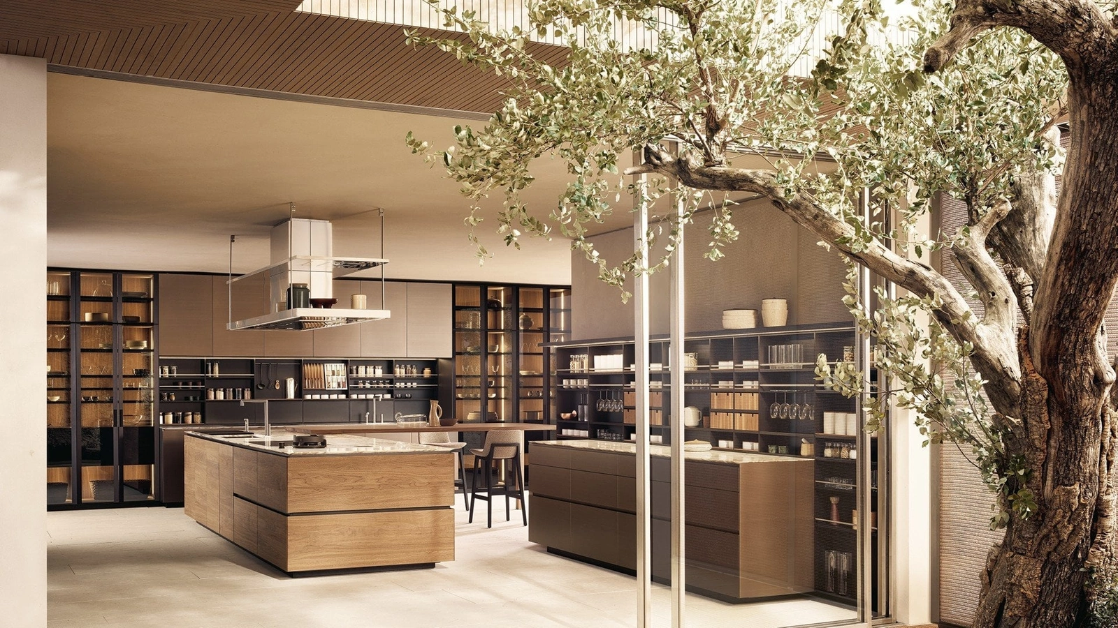 Cucina Design in Noce Canaletto e Marmo Calacatta con isola Artex di Poliform